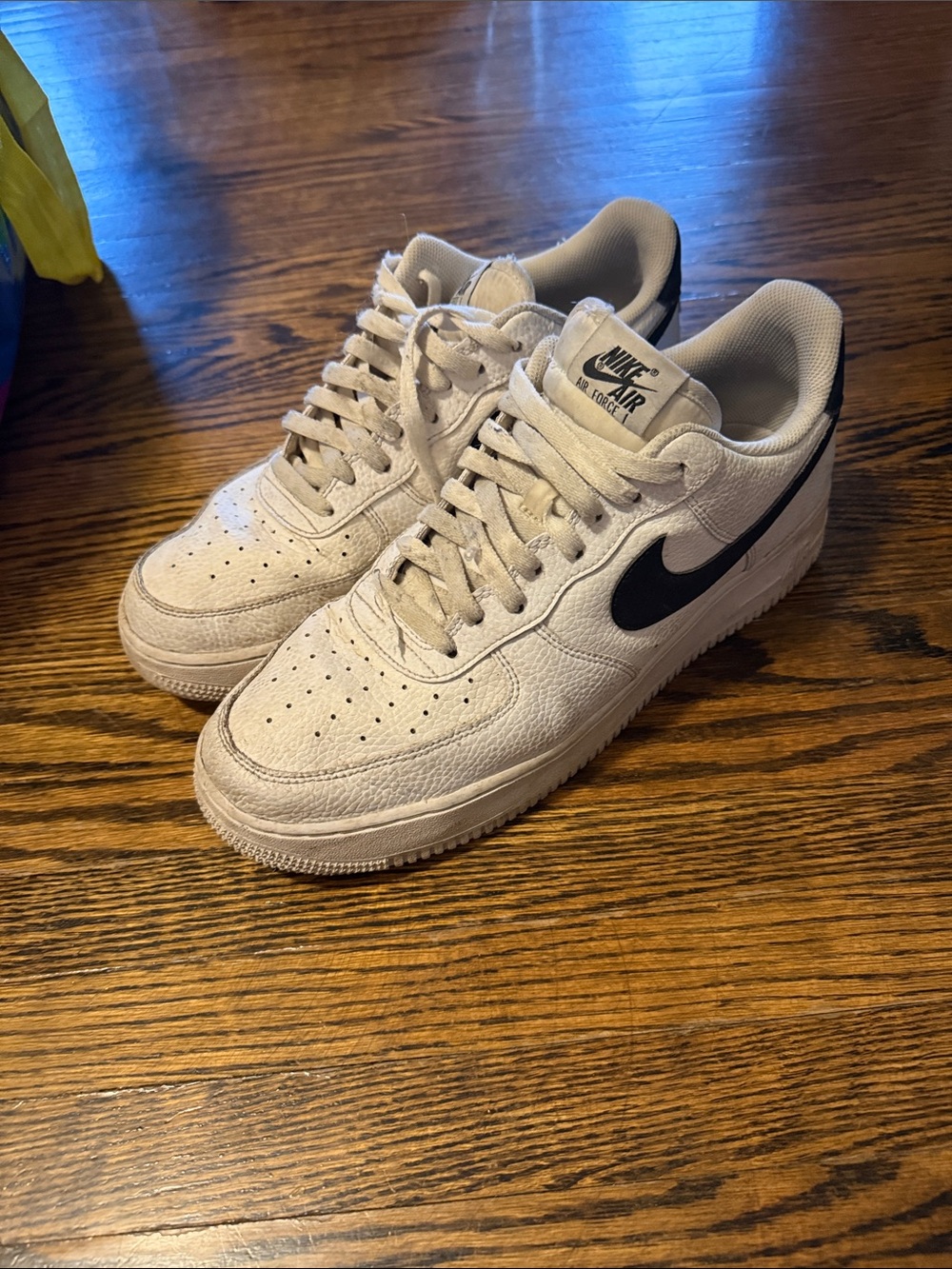 Nike White Low-Top Sneakers with Black Swoosh